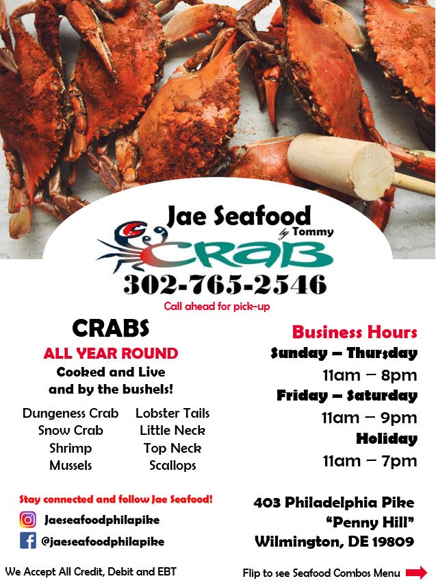 Seafood platters piled with crab and shrimp.