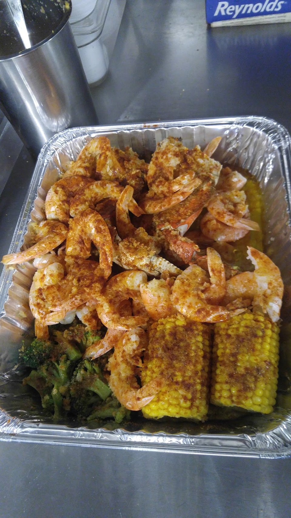Printed menu featuring crab and shrimp combos.