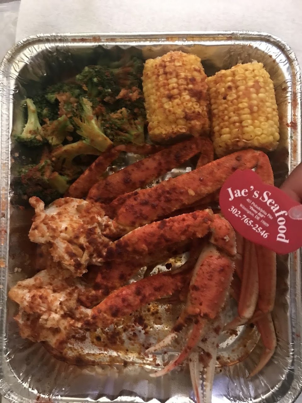 Seafood choices listed beside simple sides.