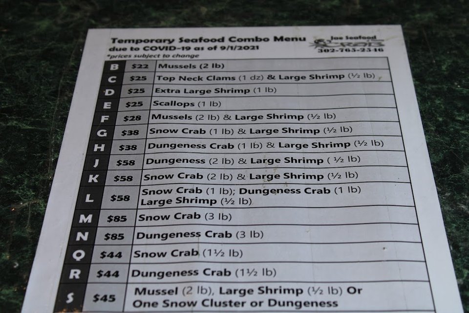 Menu board for takeout seafood specials.