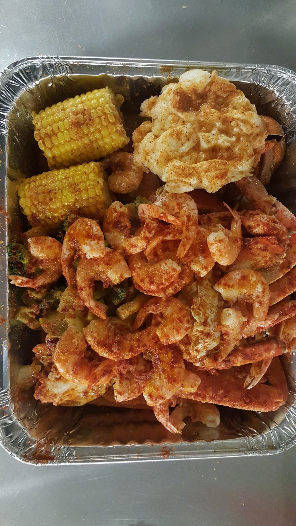 Printed menu featuring crab and shrimp combos.
